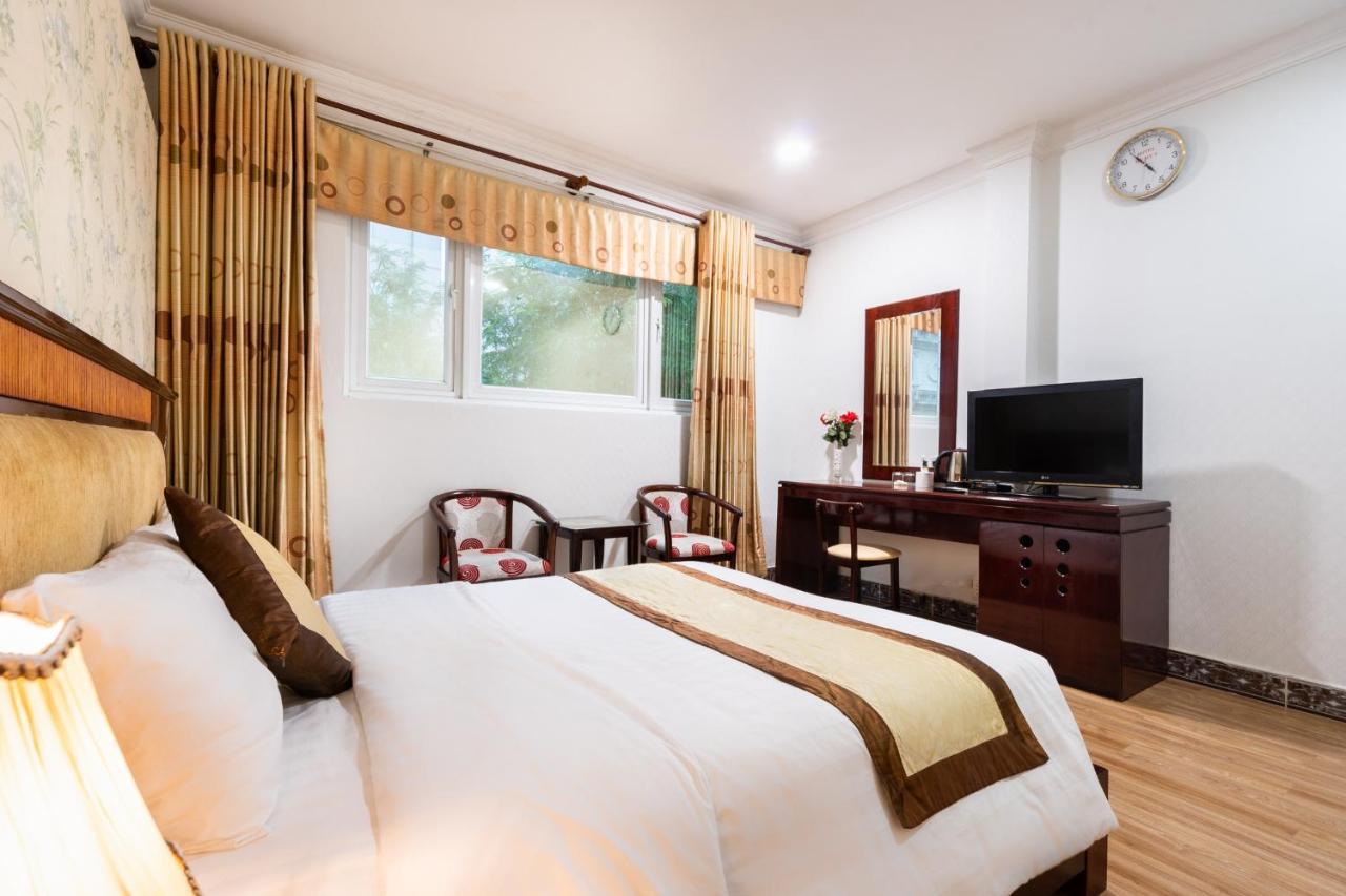 Cosmo Central Hotel Ho Chi Minh Esterno foto